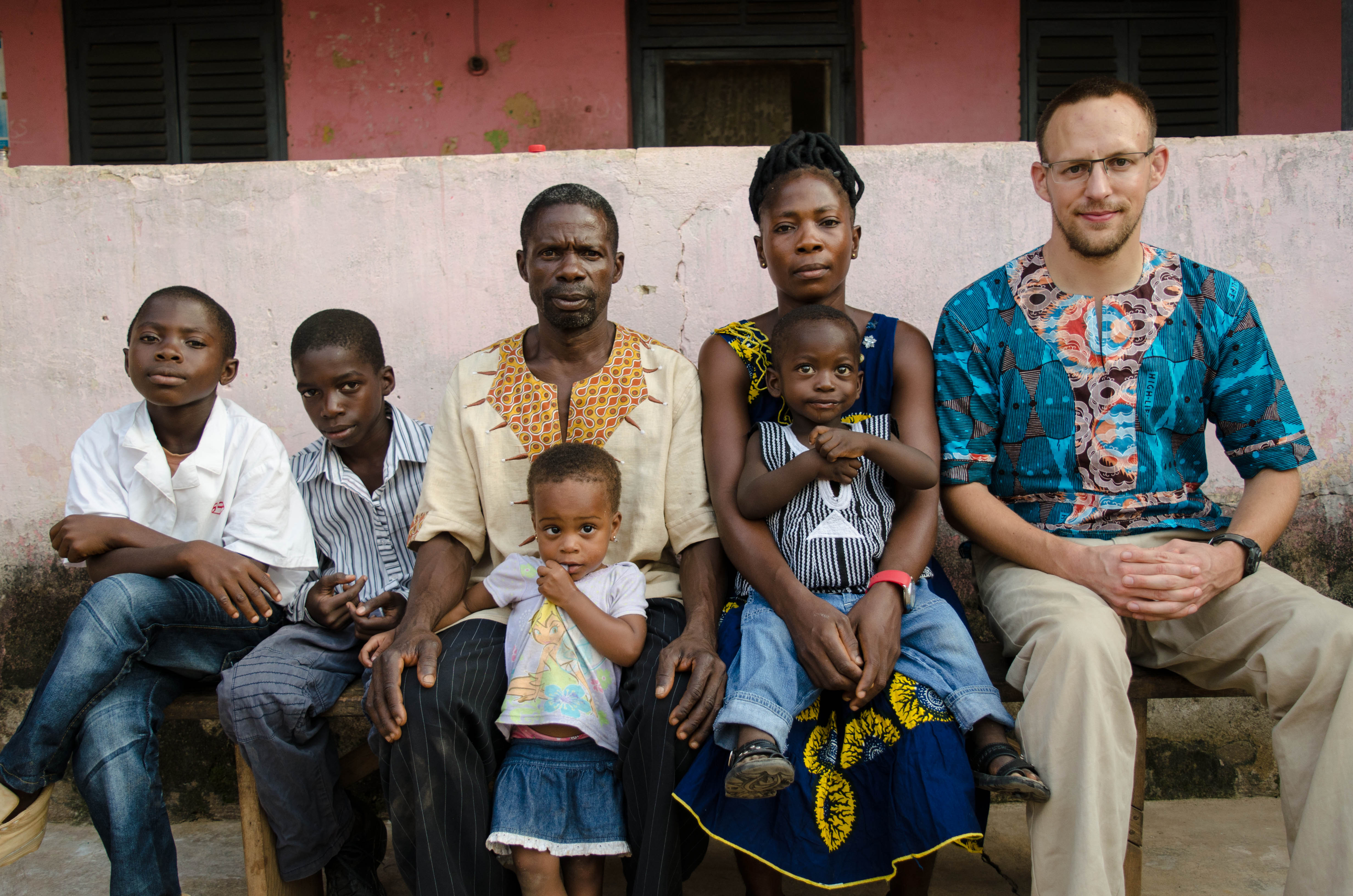 Roland with the Ghanaian family he stayed with during training, the first two months in Ghana.