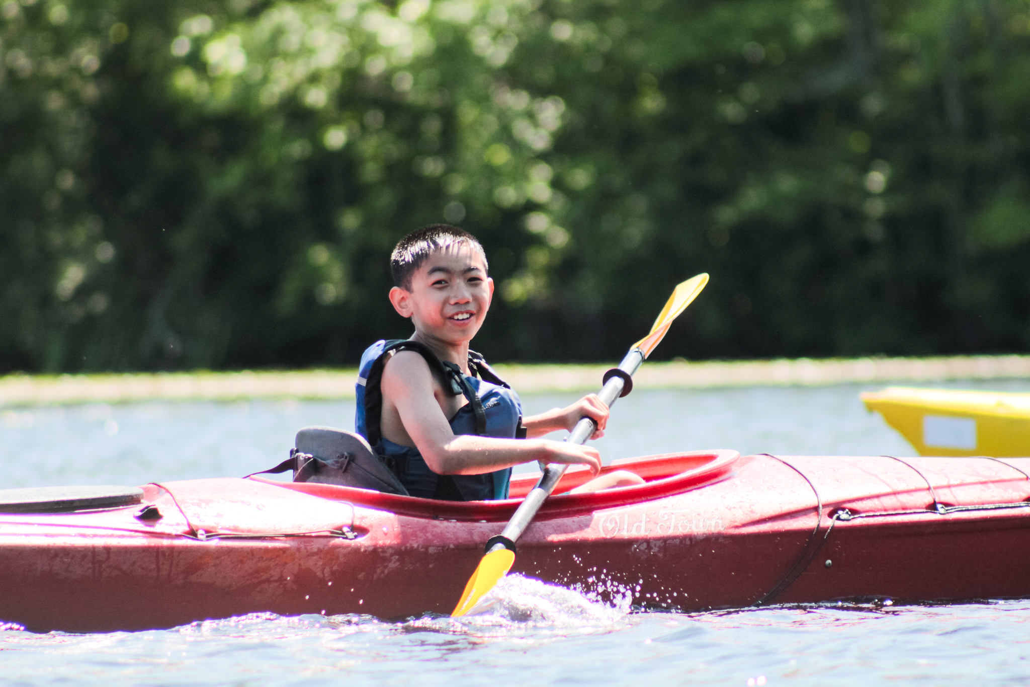 kid in canoe