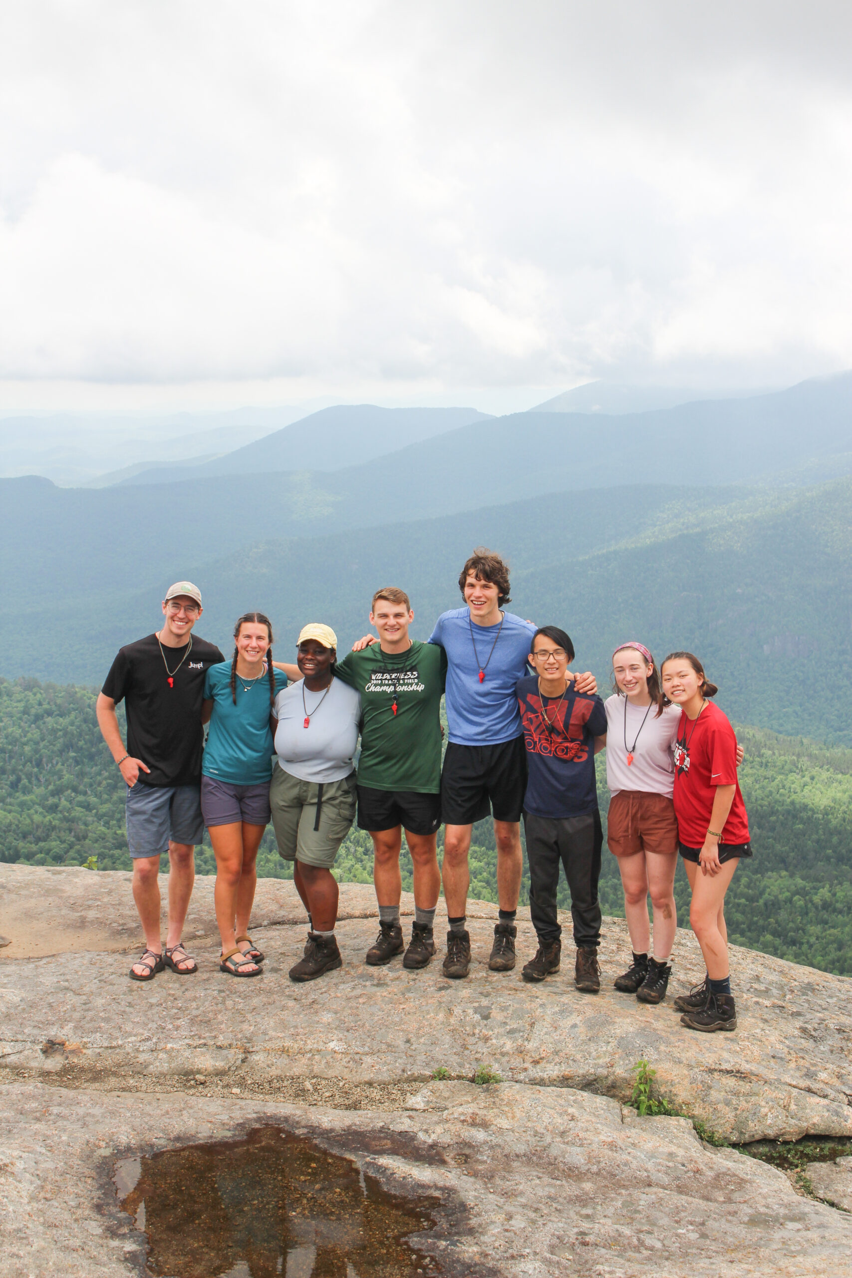 La Vida group photo at the top of a mountain