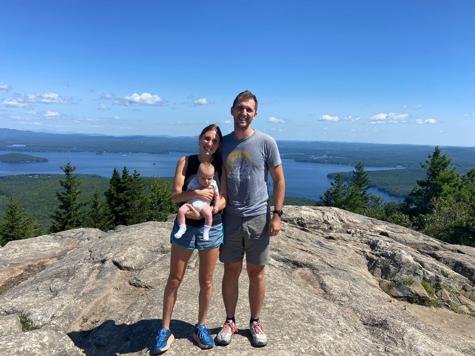 a family hiking in NH